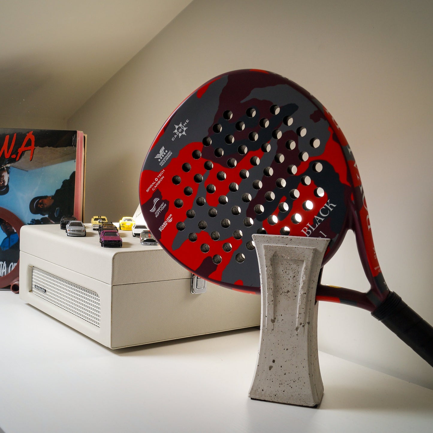 Padel racket holder