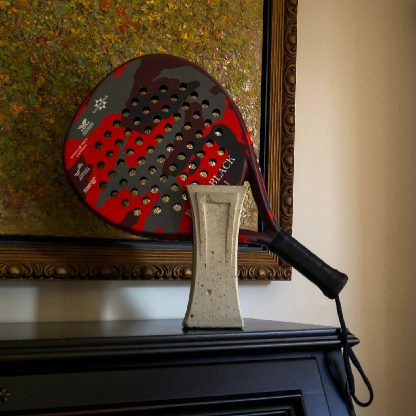 Padel racket holder
