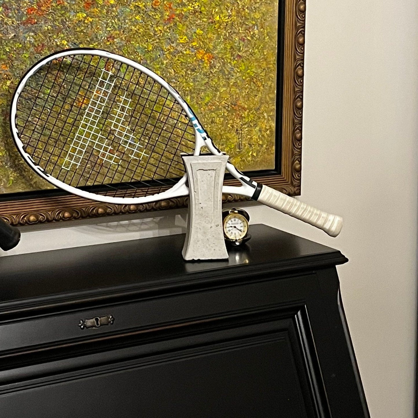 Tennis racket holder